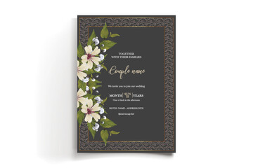 WEDDING INVITATION FRAME WITH FLOWER DECORATIONS AND FRESH LEAVES