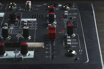 Professional mixing console on table, closeup. Radio studio equipment