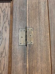 Hinge on a wooden door