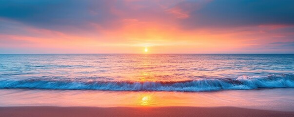 Fototapeta premium Sunset over ocean landscapes idea. A serene sunset over a tranquil ocean, reflecting vibrant colors on the water's surface.