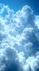 Fototapeta premium Skybound Spectacle: A breathtaking view of a vast expanse of fluffy, white clouds against a brilliant blue sky, capturing the beauty and serenity of the natural world from above. 