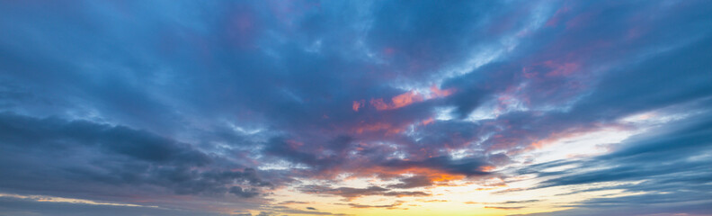 Beautiful blue sky with a pinkish orange sunset