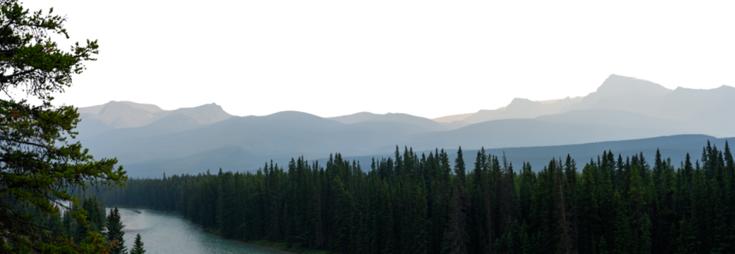 Panorama of a mountain scene with a large river, dense green forest and blue mountains in the distance with transparent sky
