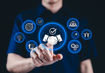 Trusted partnership and business collaboration concept. Businessman interact with digital handshake icons, represent trust, teamwork, successful collaboration in corporate partnerships, trustworthy,