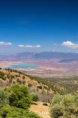 The Bin el Ouidane Dam is an arch dam on the El-Abid River in Azilal Province, Morocco