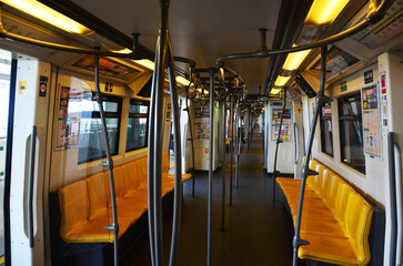 Inside interior design and thai passengers people and foreign travelers journey BTS skytrain running send and receive at Bang Na station go to Chatuchak city on July 5, 2014 in Bangkok, Thailand