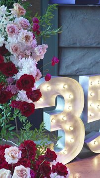 Glowing number 35 and festive decoration