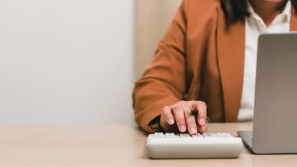Financial accounting and business budgeting concept. Professional calculating business expenses...