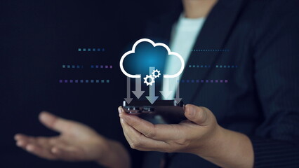 Cloud computing and data management. businessman presents a glowing cloud computing with a download and digital business innovation.