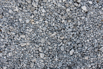 A textured surface of small gray gravel stones, perfect for industrial, natural, or design use. Ideal for landscaping, construction, and earthy themes.