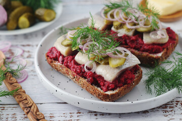 Scandinavian sandwiches with herring and beetroot	
