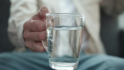 Hand shaking.
Symptoms of Parkinson's disease.
A man has Parkinson's disease.
Nervous disease.
Hands shake due to stress.
Health problems - Powered by Adobe