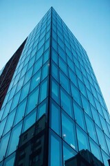 Fototapeta premium Abstract close-up of glass façade of blue office building, business, futuristic