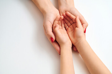 Mother hands gently holding daughter hands symbolizing care love support nurturing warmth tenderness motherhood relationship family bonding connection trust protection concept with copy space.