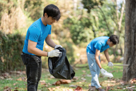 Environmental Responsibility and Community Service. Volunteers are actively involved in litter collection, emphasizing sustainability in their actions.