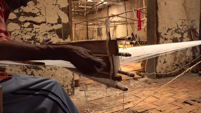 Close-up of of traditional wooden weaving machine in small workshop in rural Ethiopia
