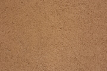 Soil wall texture of clay house structure. Mud background. 