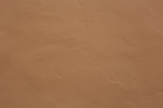 Wall of home made from mud or adobe house. Clay wall texture of House structure