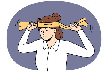 Tired woman puts on headband to complete task or demonstrate readiness to deal with business problems. Upset business lady wants to continue fulfilling duties despite troubles causing stress