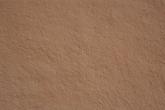 Wall of clay structure, soil background made form mud