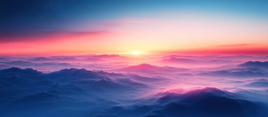 Obraz premium Majestic sunrise above a sea of clouds and mountains.