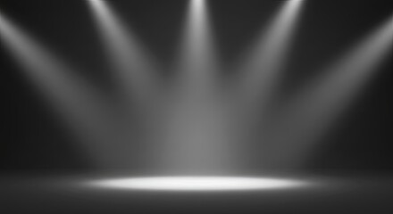 A black background with three bright lights shining on it