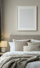Elegant bedroom arrangement featuring a framed art print above a cozy bed setup