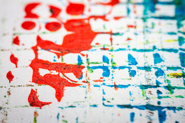 Extreme close up of colorful acrylic paint texture showing brush strokes. Selective focus.