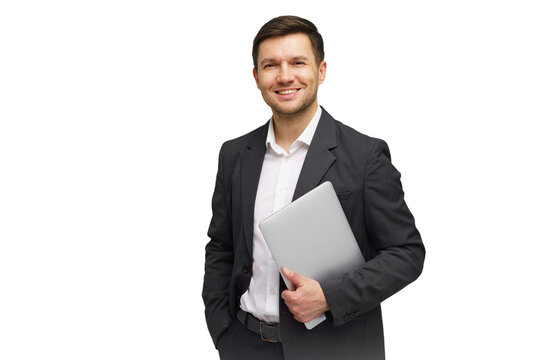 Professional man in business attire holding a laptop and smiling against a white background