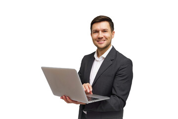Business professional smiles while holding a laptop and working in a modern office environment