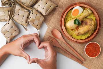 Lontong opor ayam is an Indonesian traditional dish usually served during eid Mubarak, Eid al Fitr...