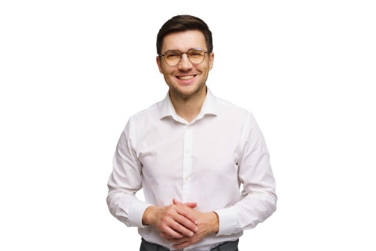 Friendly young man in a white shirt smiles confidently against a plain background