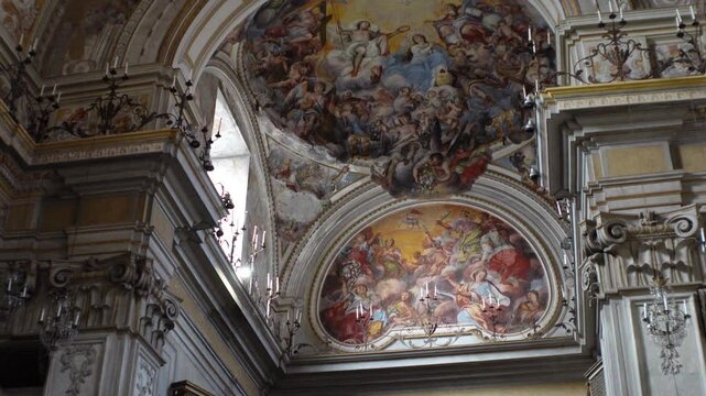 Beautiful frescoes inside apse (part of the dome) in San Benedetto church in Catania, historic art and cultural heritage in Italy
