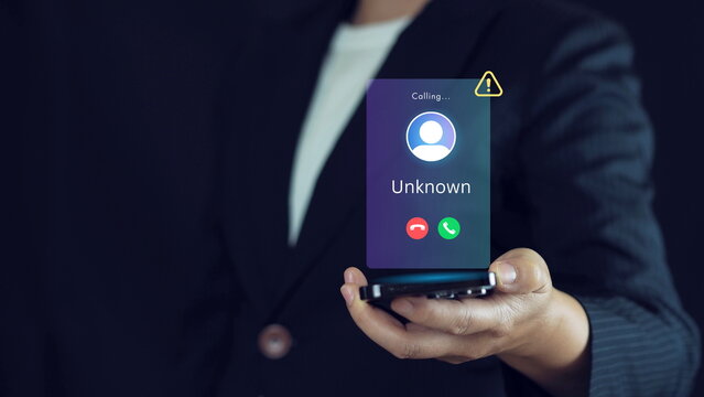 Mobile Security Against Cybercrime. Scam or spam alert calls, person receiving unknown caller notification with a Warning Messages to Prevent Scams