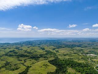 Naklejka premium East Sumba, East Nusa Tenggara , Indonesia – 03. 30. 2024 – Waingapu City as seen from the western hills of the city