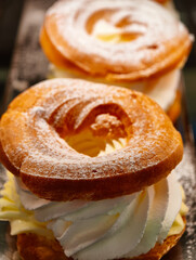 Cream-Filled Pastry Rings Freshly Baked Dessert Professional Food Photography Gourmet Bakery Delectable Treats Restaurant Menu Premium Baked Goods