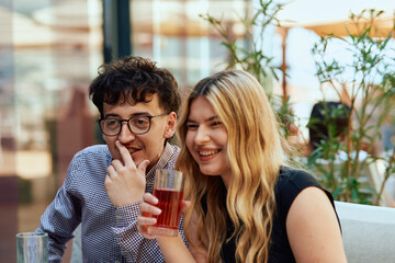 A Couple Enjoying a Refreshing Juice and Relaxing on a Summer Day at a Caffee