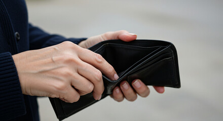 man holding an empty wallet