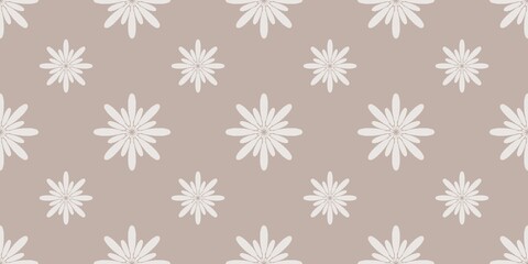 Seamless pattern with floral motifs in brown tones	