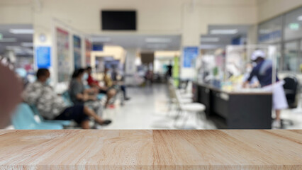 Wooden tabletop on blurred OPD background, can be used for display or montage your products.