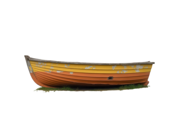 Colorful Boat on Grass with Worn Paint and Unique Design Elements