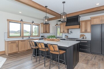 Modern kitchen interior features cabinetry countertops and island seating