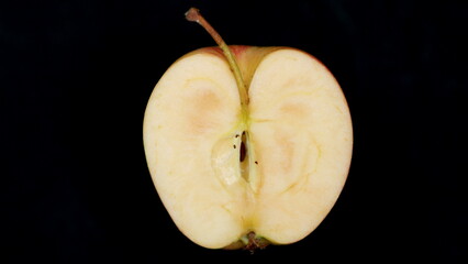 Freshly Cut Apple Halved Exposing Its Seeds for a Delicious and Healthy Snack Option