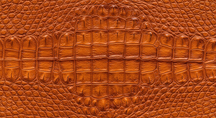 Close-up of the texture of orange and brown leather, with fine lines that resemble scales on an alligator skin pattern. Generative AI.