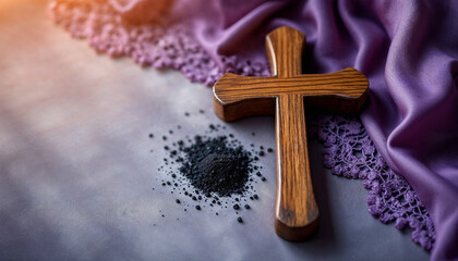 a cross on the table and a small pile of ashes
