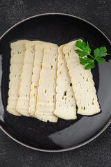 Tartiflette cheese slices soft cheese tasty fresh gourmet food background on the table rustic food top view copy space