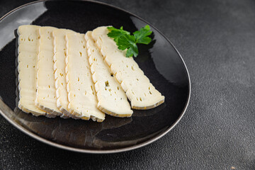 Tartiflette cheese slices soft cheese tasty fresh gourmet food background on the table rustic food top view copy space