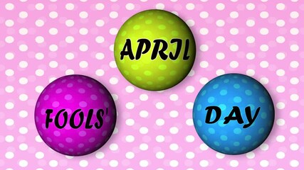 April Fools' Day - Text on a background with a pattern and balls in motion