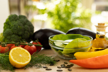 Vegetables from the garden. Ingathering. Making salad at home in the kitchen