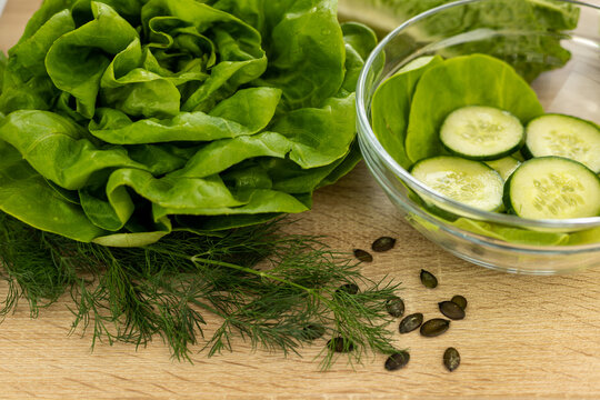 Vegetables from the garden. Ingathering. Making salad at home in the kitchen